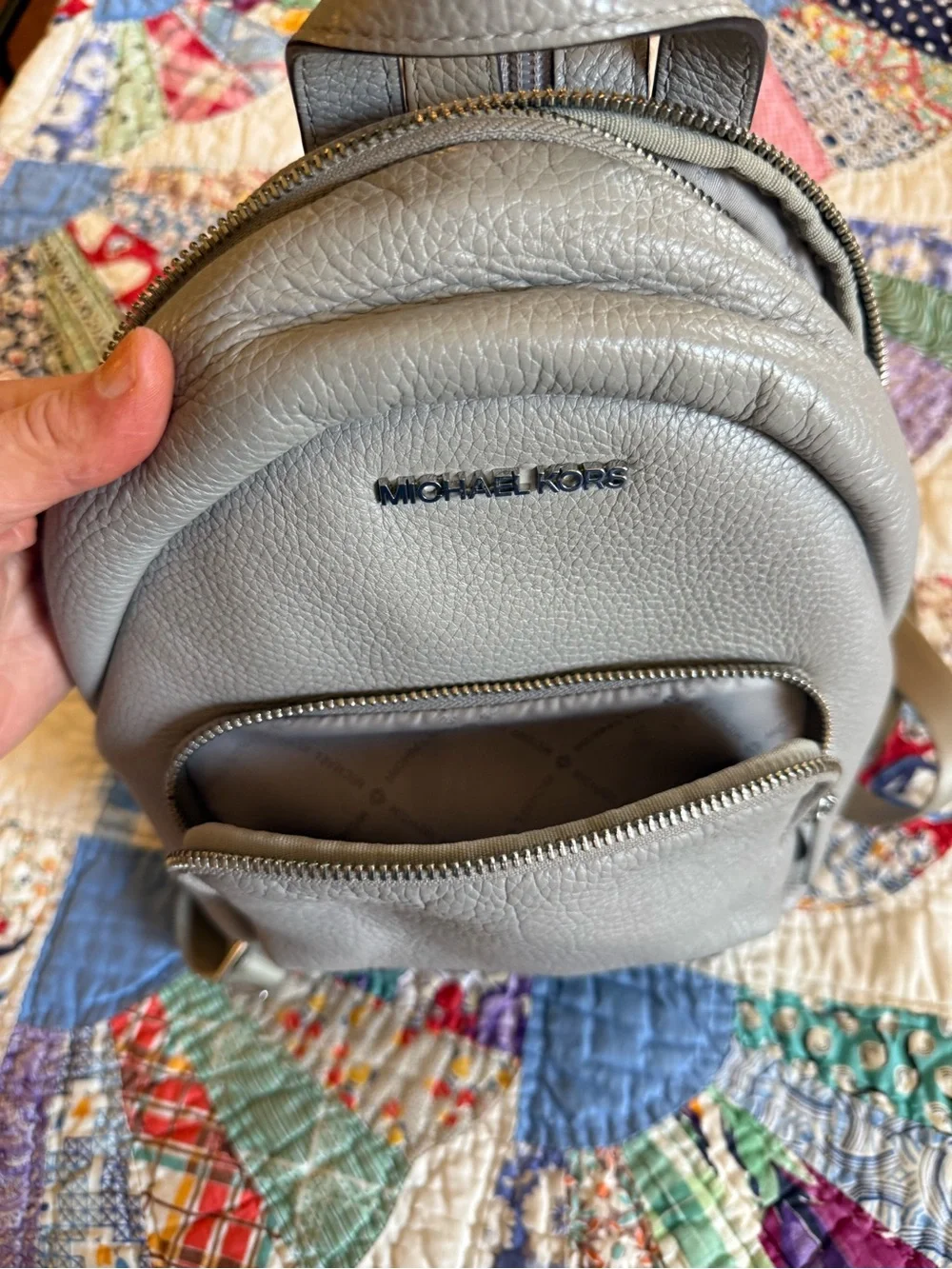 Michael Kors Pebbled Leather Mini Backpack in Light Gray with Gold Hardware